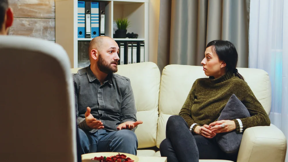 Psychiatrist speaking with a patient during a psychiatric consultation